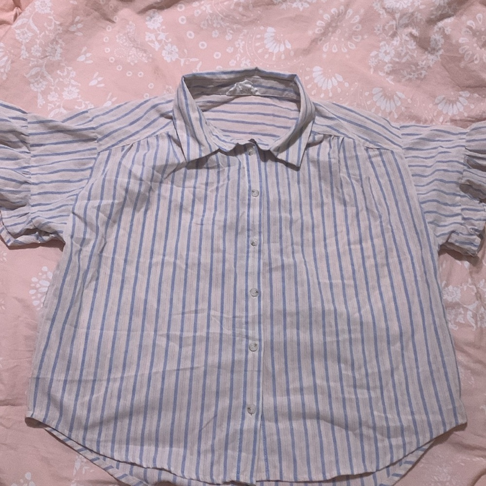 Button up with ruffle sleeves. Size large. White with light pink & blue stripes
